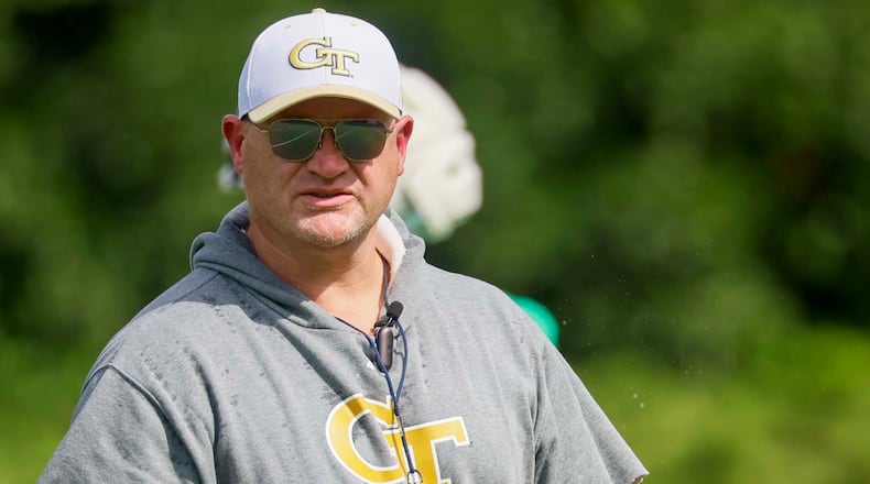 Georgia Tech coach Brent Key observes the offense practicing during the first day of training at Rose Bowl Field and the Brock Football Practice Facility on Monday, Aug. 3, 2026, in Atlanta. (Miguel Martinez/AJC)