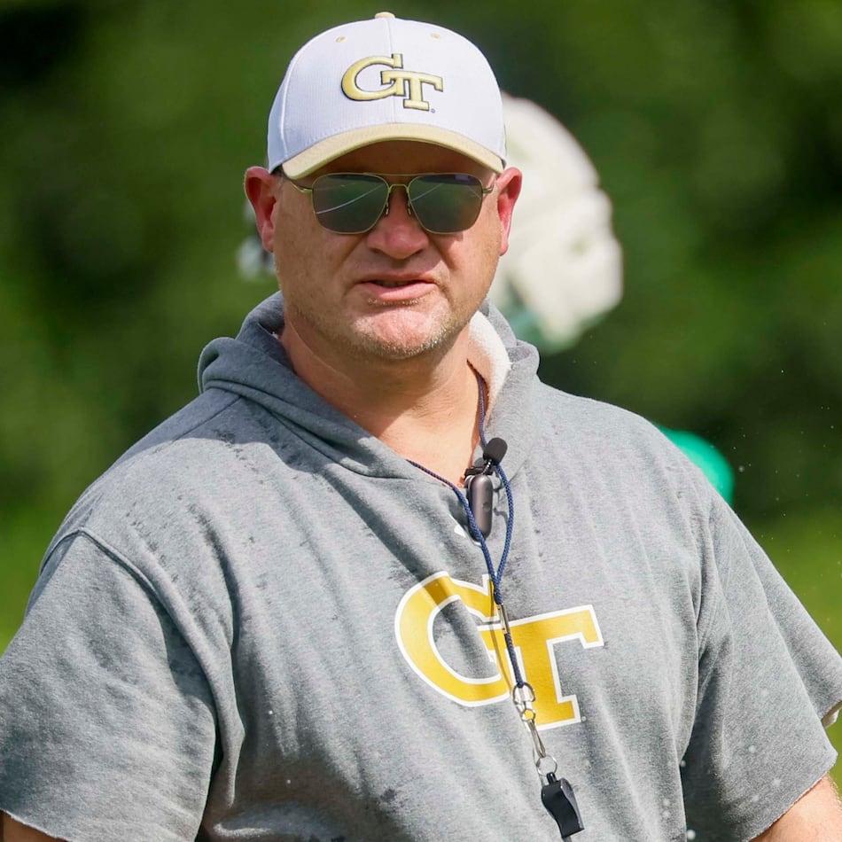 Georgia Tech head coach Brent Key observes the offensive team practicing on the field during the first day of football training at Rose Bowl Field and the Mary and John Brock Football Practice Facility, Monday, August 3, 2026, in Atlanta. (Miguel Martinez/AJC)