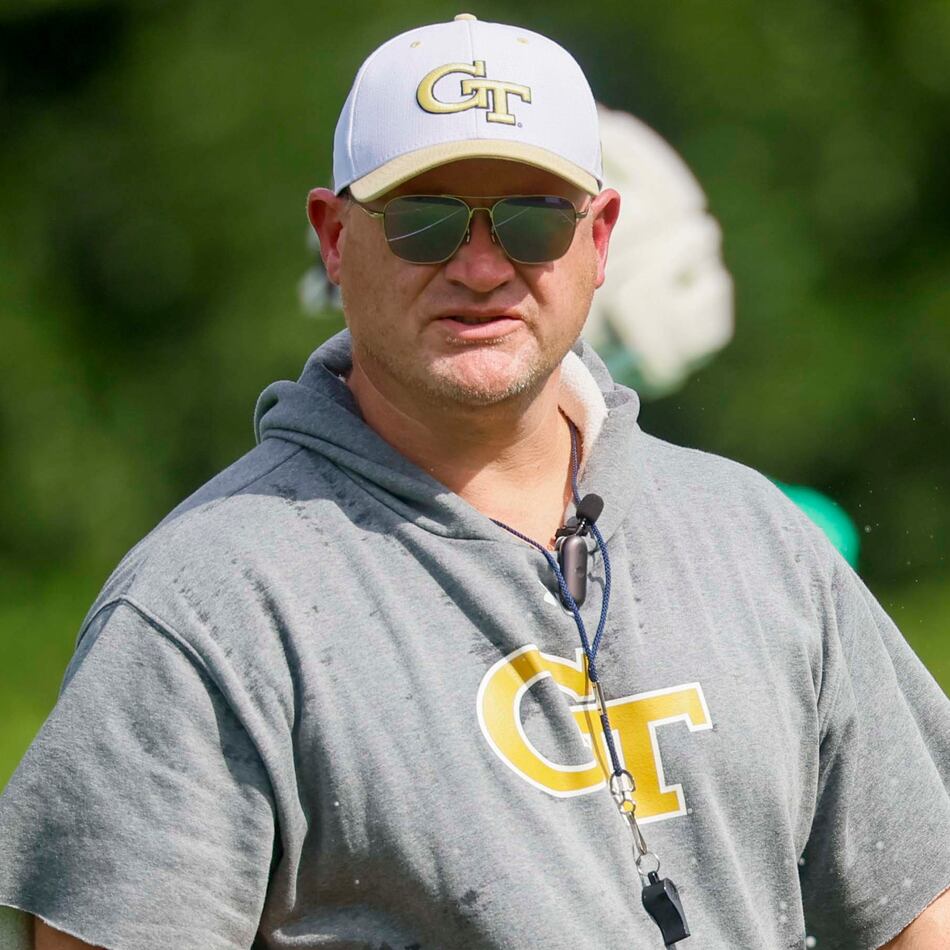 Georgia Tech coach Brent Key observes the offense practicing during the first day of training at Rose Bowl Field and the Brock Football Practice Facility on Monday, Aug. 3, 2026, in Atlanta. (Miguel Martinez/AJC)