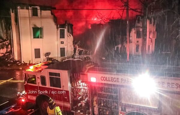 Four people were hurt in a College Park apartment fire. JOHN SPINK / JSPINK@AJC.COM
