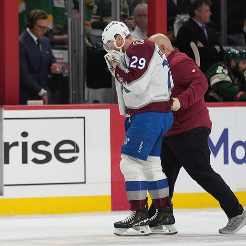 Colorado Avalanche center Nathan MacKinnon (29) leaves the ice during the second period of Game 4 in an NHL Stanley Cup hockey second-round playoff series against the Minnesota Wild Monday, May 11, 2026, in St. Paul, Minn. (AP Photo/Abbie Parr)