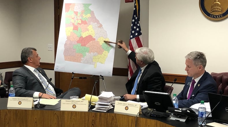 Georgia’s court-ordered political map overhaul begins this week, and we’ll soon see the first glimpses of the proposed new districts ahead of the special legislative session that starts Wednesday. Pictured: State Sen. Bill Cowsert, a Republican from Athens, points to new Senate districts during a committee meeting. (Mark Niesse/mark.niesse@ajc.com)