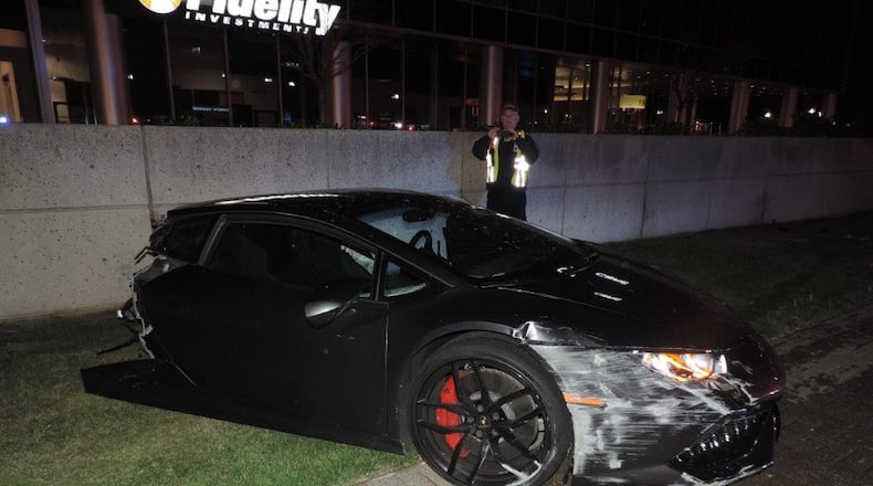 A Lamborghini was sheared in half after its driver hit a concrete light pole. (Photo: Fairfax County Fire and Rescue)