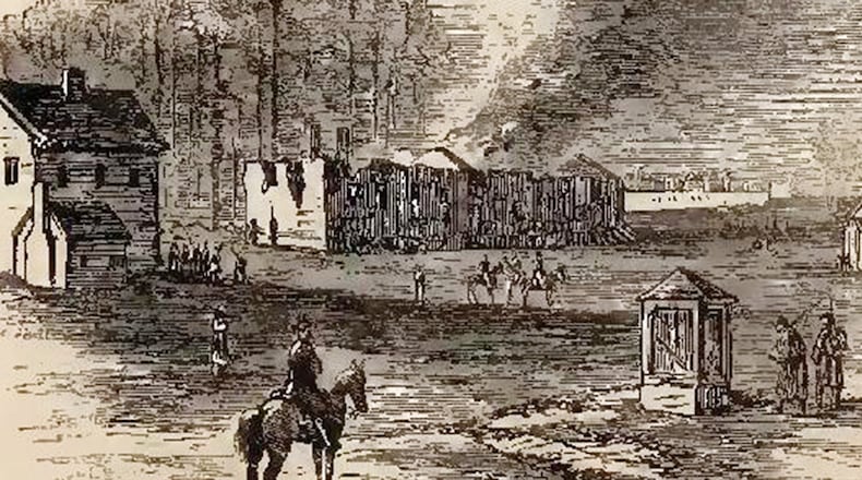 Federal troops burn the railroad station at Madison during their March to the Sea. Harper's Weekly, Jan. 7, 1865.