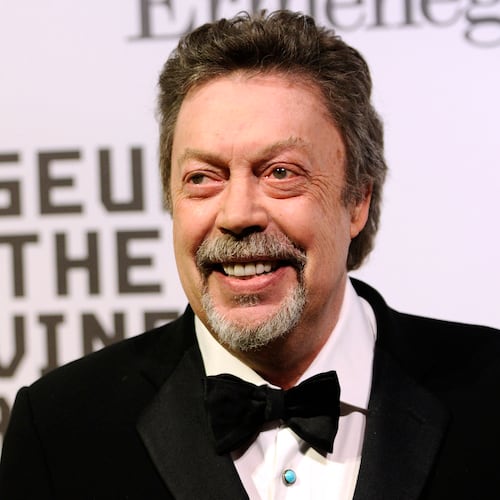 FILE - Tim Curry attends the Museum of the Moving Image salute to Alec Baldwin in New York on Feb. 28, 2011. (AP Photo/Peter Kramer, File)