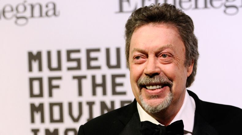 FILE - Tim Curry attends the Museum of the Moving Image salute to Alec Baldwin in New York on Feb. 28, 2011. (AP Photo/Peter Kramer, File)