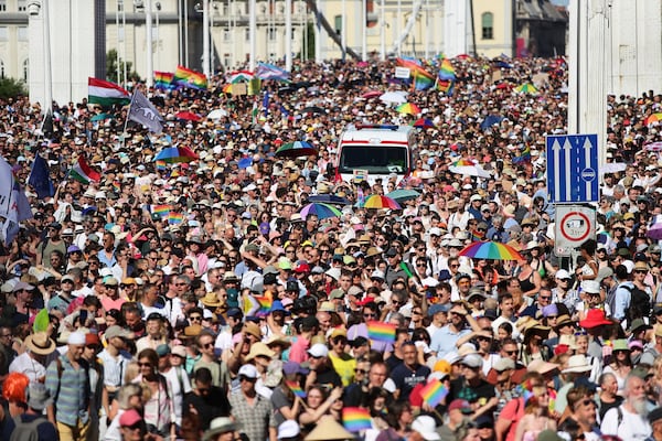 Participants in the Pride march cross the Elisabeth Bridge in Budapest, Hungary, Saturday, June 28, 2025. (AP Photo/Rudolf Karancsi)