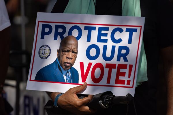 Protestors gather at Ebenezer Baptist Church during a “Good Trouble” protest in Atlanta on Thursday, July 17, 2025, part of a national effort to express frustration with the Trump administration. (Arvin Temkar / AJC)