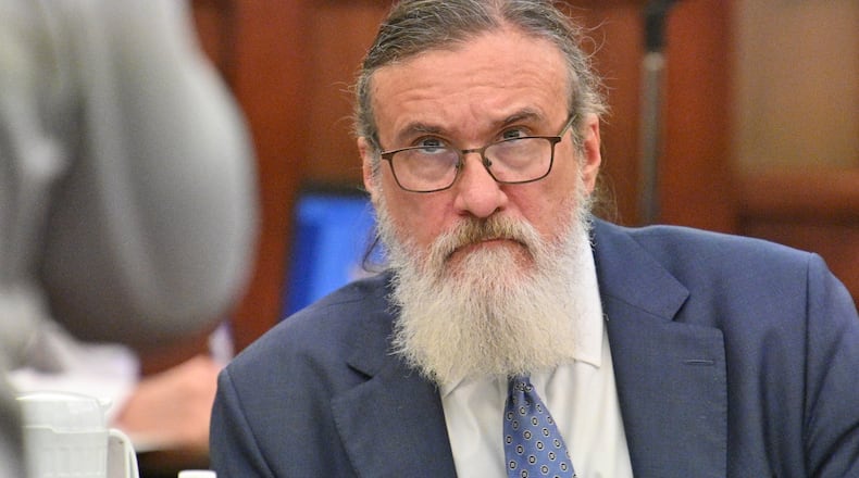 Attorney William McCall Calhoun Jr., one of the more than 725 people criminally charged in the Jan. 6, 2021 U.S. Capitol riot, has continued to defend clients in the southwest Georgia community of Americus. He is seen here during jury selection for a trial at the Sumter County Courthouse in Americus earlier this week. (Hyosub Shin / Hyosub.Shin@ajc.com)