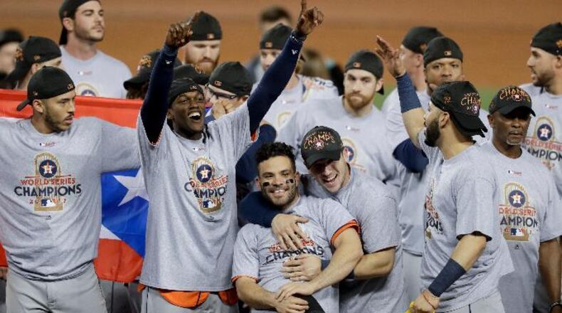 The Houston Astros celebrate after their win against the Los Angeles Dodgers in Game 7 of baseball's World Series Wednesday, Nov. 1, 2017, in Los Angeles. The Astros won 5-1 to win the series 4-3. (AP Photo/Alex Gallardo)