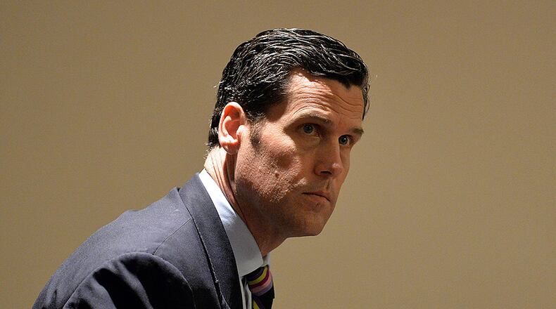 In this file photo, Rick Warren, the Buckhead investor who has bought up some 10 percent of Atlanta's English Avenue neighborhood, appears with his defense attorney George Lawson before Atlanta Municipal Court Judge Crystal Gaines, Wednesday May 27, 2015.