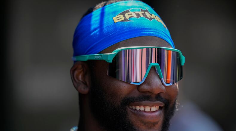 Braves' Michael Harris II smiles in the dugout during the third inning of a baseball game against the Chicago Cubs, Thursday, May 23, 2024, in Chicago. (AP Photo/Erin Hooley)