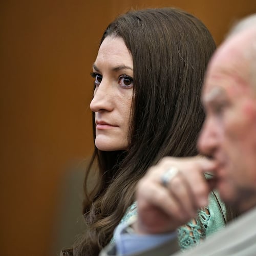 Lindsay Clancy watches jurors enter the courtroom for their second day of deliberations as defense attorney Kevin Reddington sits to her right at Plymouth Superior Court in Plymouth, Mass., Friday, Aug. 28, 2026. (Greg Derr/The Patriot Ledger via AP, Pool)