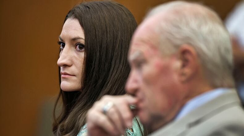 Lindsay Clancy watches jurors enter the courtroom for their second day of deliberations as defense attorney Kevin Reddington sits to her right at Plymouth Superior Court in Plymouth, Mass., Friday, Aug. 28, 2026. (Greg Derr/The Patriot Ledger via AP, Pool)