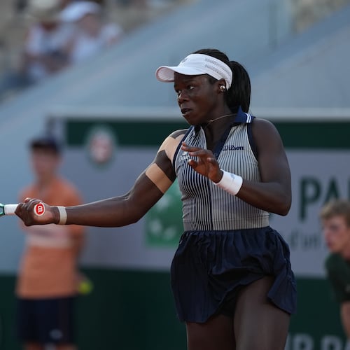 Victoria Mboko of Canada returns to Katerina Siniakova of the Czech Republic during their second round women's singles tennis match at the French Open tennis tournament in Paris, Thursday, May 28, 2026. (AP Photo/Thibault Camus)