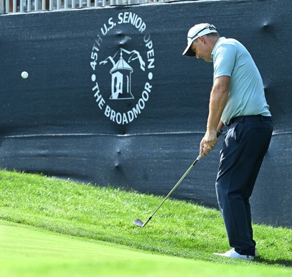 Padraig Harrington hits onto the green on the 10th hole on the first day at the U.S. Senior Open Championship at Broadmoor Golf Club in Colorado Springs, Colo., Thursday, June 26, 2025. (Jerilee Bennett/The Gazette via AP)