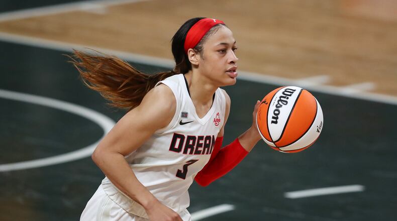 Dream guard Chennedy Carter drives against the Chicago Sky on Wednesday, May 19, 2021, in College Park.  “Curtis Compton / Curtis.Compton@ajc.com”