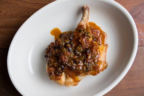 Roasted chicken with a "country captain" sauce, prepared by the chef Mashama Bailey at the Houseman restaurant in New York, April 20, 2016. Bailey, of the Grey restaurant in Savannah, Ga., and Ned Baldwin, of the Houseman, worked closely together at the influential Prune restaurant in New York before opening their own places, and they decided to trade kitchens this month. (Evan Sung/The New York Times)