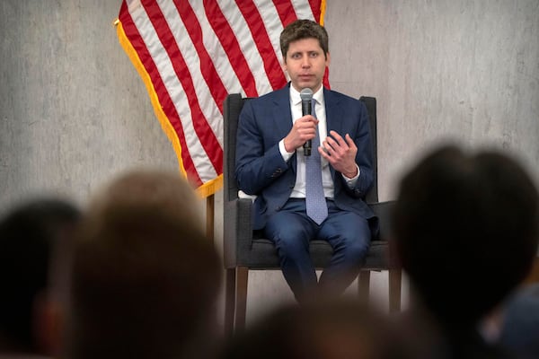 OpenAI CEO Sam Altman speaks during a discussion at the Federal Reserve Integrated Review of the Capital Framework for Large Banks Conference at the Federal Reserve in Washington, Tuesday, July 22, 2025. (AP Photo/Mark Schiefelbein)