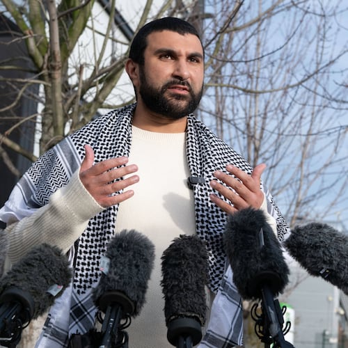 British political commentator Sami Hamdi speaks to the media in London, Thursday, Nov. 13, 2025, on his return to the U.K. after he was arrested by Immigration and Customs Enforcement on Oct. 26 while on a speaking tour in the U.S.. (AP Photo/Thomas Krych)