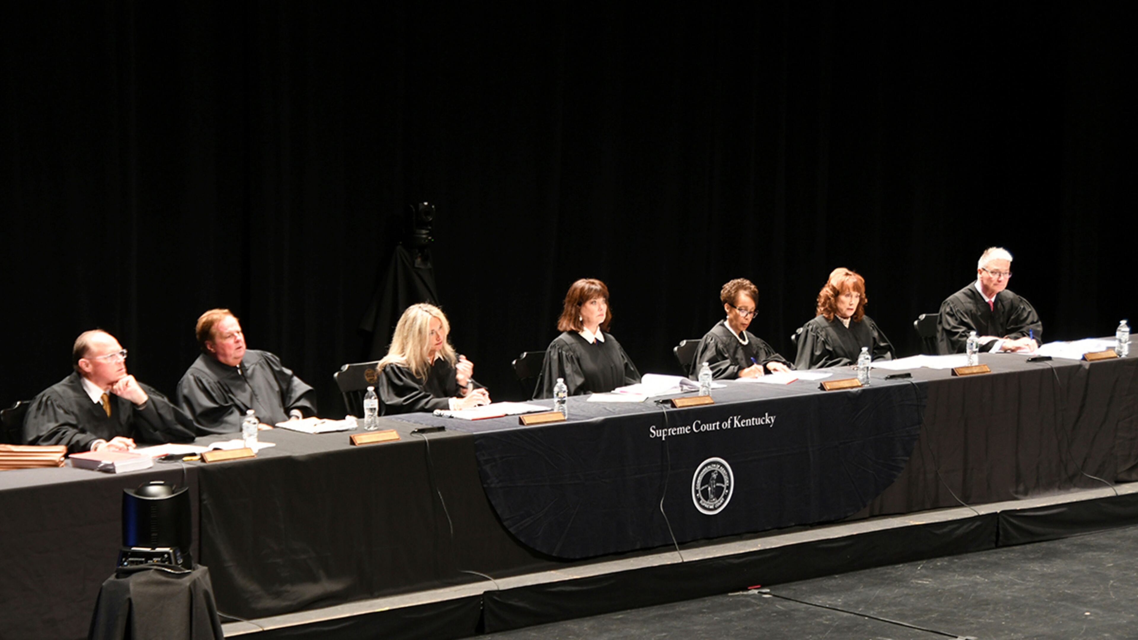 The Kentucky Supreme Court hears oral arguments at Centre College's Norton Center for the Arts in Danville, Ky., Sept. 10, 2025. Seated from left are Justice Shea Nickell, Justice Kelly Thompson, Justice Angela McCormick Bisig, Chief Justice of the Commonwealth Debra Hembree Lambert, Justice Pamela R. Goodwine, Justice Michelle M. Keller and Justice Robert B. Conley. (Jim Hoffman/Administrative Office of the Courts via AP)