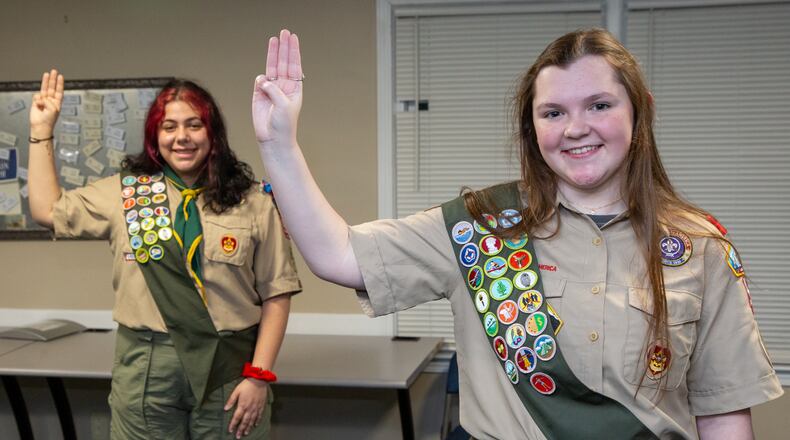 New Eagle Scouts Zoe Rosenberg (left) and Veronica Roark at the Roswell United Methodist Church scout hut in Roswell. The two are part of the all-girls Scout Troop 432, that meets at the church on Thursday nights. They are the first girls in the Northern Ridge Scout District to earn the Eagle Scout rank, and are among the nation's Inaugural Class of Female Eagle Scouts. PHIL SKINNER FOR THE ATLANTA JOURNAL-CONSTITUTION.
