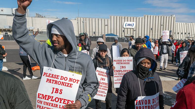 Workers from the JBS Beef Plant protest across the road from the plant on March 16, 2026 in Greeley, Colo. (Jerilee Bennett/The Gazette via AP)