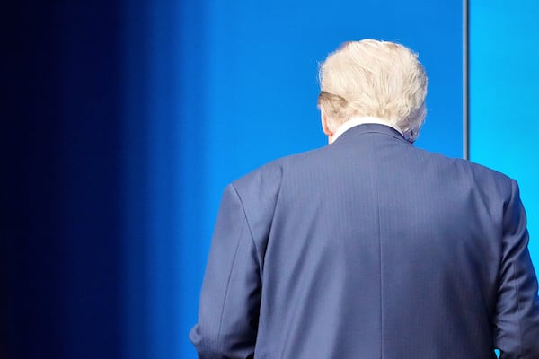 President Donald Trump leaves at the end of a press conference after the plenary session at the NATO summit in The Hague, Netherlands, Wednesday, June 25, 2025. (AP Photo/Markus Schreiber)