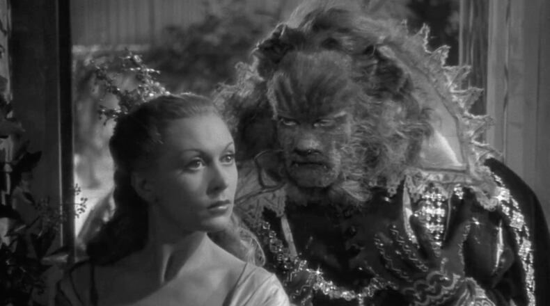 Josette Day and Jean Marais in Jean Cocteau's "The Beauty and the Beast." The 1946 film will be accompanied by Philip Glass' score, "La Belle et la Bete," in the Atlanta Opera performance. (Courtesy of Janus Films)