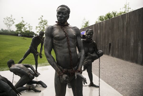 MONTGOMERY, AL - APRIL 26: A sculpture commemorating the slave trade greets visitors at the entrance National Memorial For Peace And Justice on April 26, 2018 in Montgomery, Alabama. The memorial is dedicated to the legacy of enslaved black people and those terrorized by lynching and Jim Crow segregation in America. Conceived by the Equal Justice Initiative, the physical environment is intended to foster reflection on America’s history of racial inequality. (Photo by Bob Miller/Getty Images)