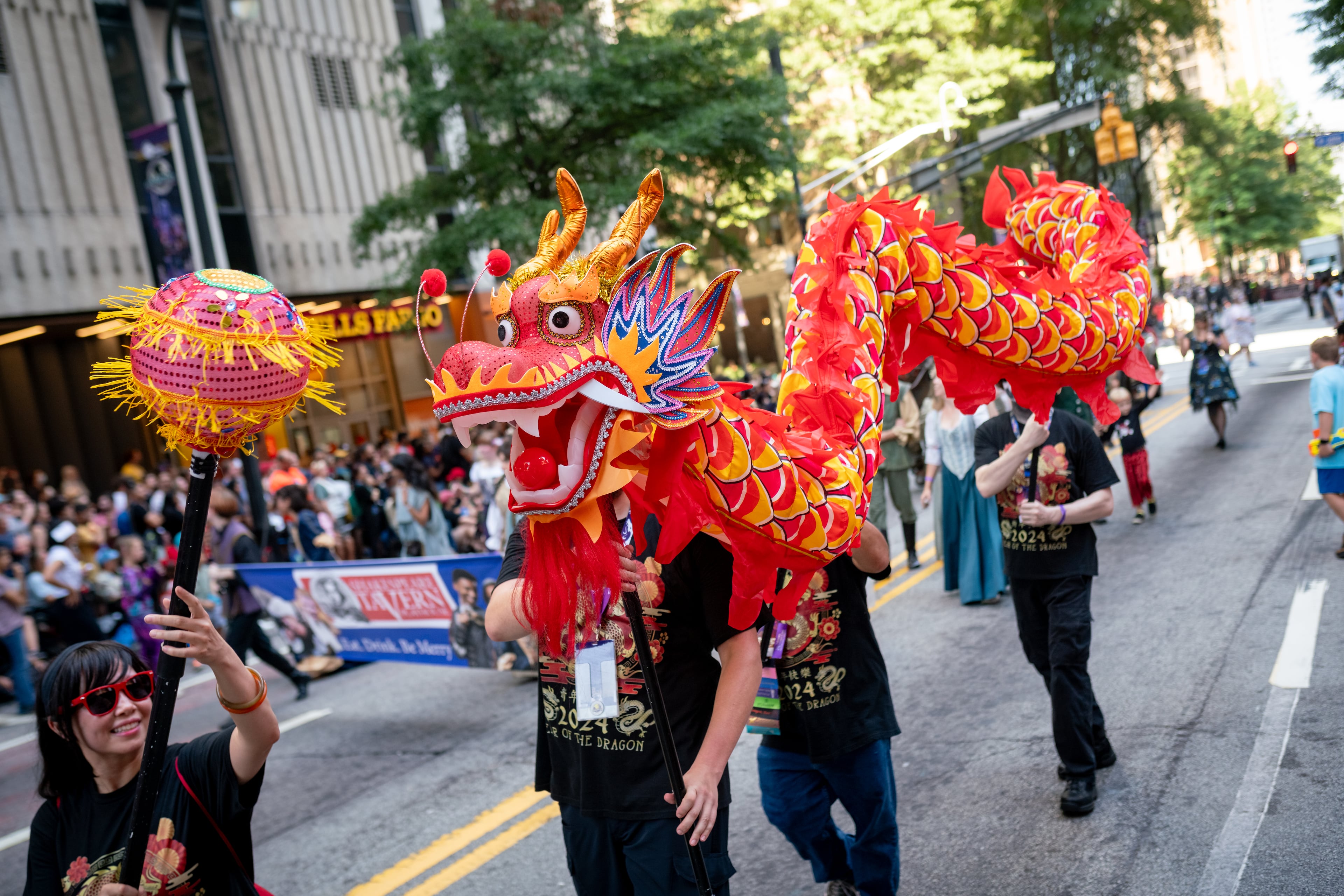 Thousands lined up along Peachtree Street on Saturday morning, August 31, 2024, for the annual Dragon Con parade in Atlanta. (Ben Hendren for The Atlanta Journal-Constitution)