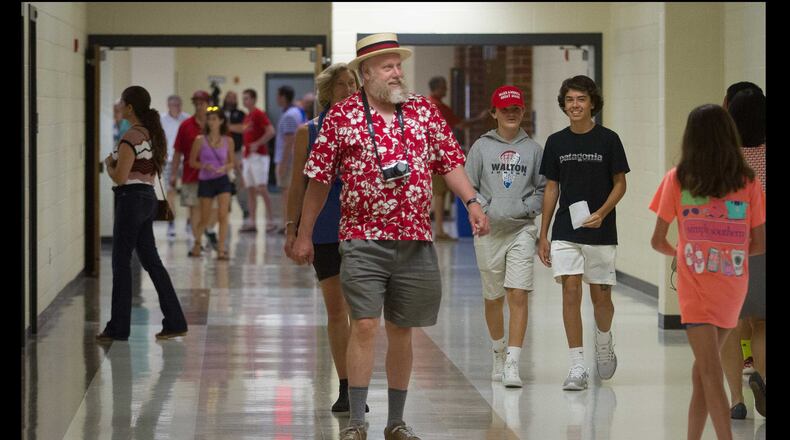 Parents and students fill the halls during an open house of the newly completed first phase of construction of Walton High School in Marietta, on Sunday, July 30, 2017. All of the construction is scheduled to be completed mid-2019.