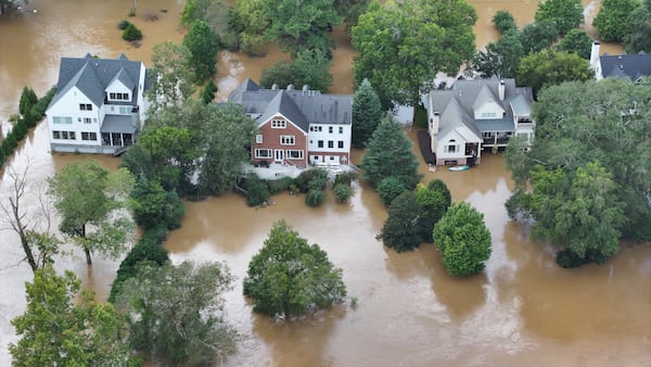 An aerial view shows the Vinings area flooded after Hurricane Helene on Sept. 27, 2024. (Miguel Martinez/AJC 2024)