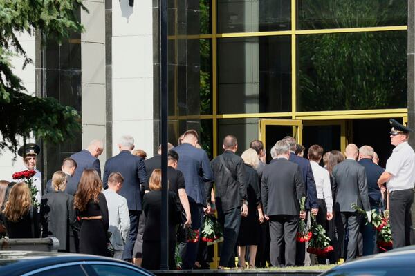 People line up to bid farewell to Roman Starovoit, the former transport minister who died in apparent suicide after his dismissal, at the morgue of the Central Clinical Hospital in Moscow, Russia, Thursday, July 10, 2025. (AP Photo)