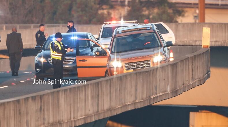 Police discovered the body of a 33-year-old driver slumped in a wrecked orange Land Rover.