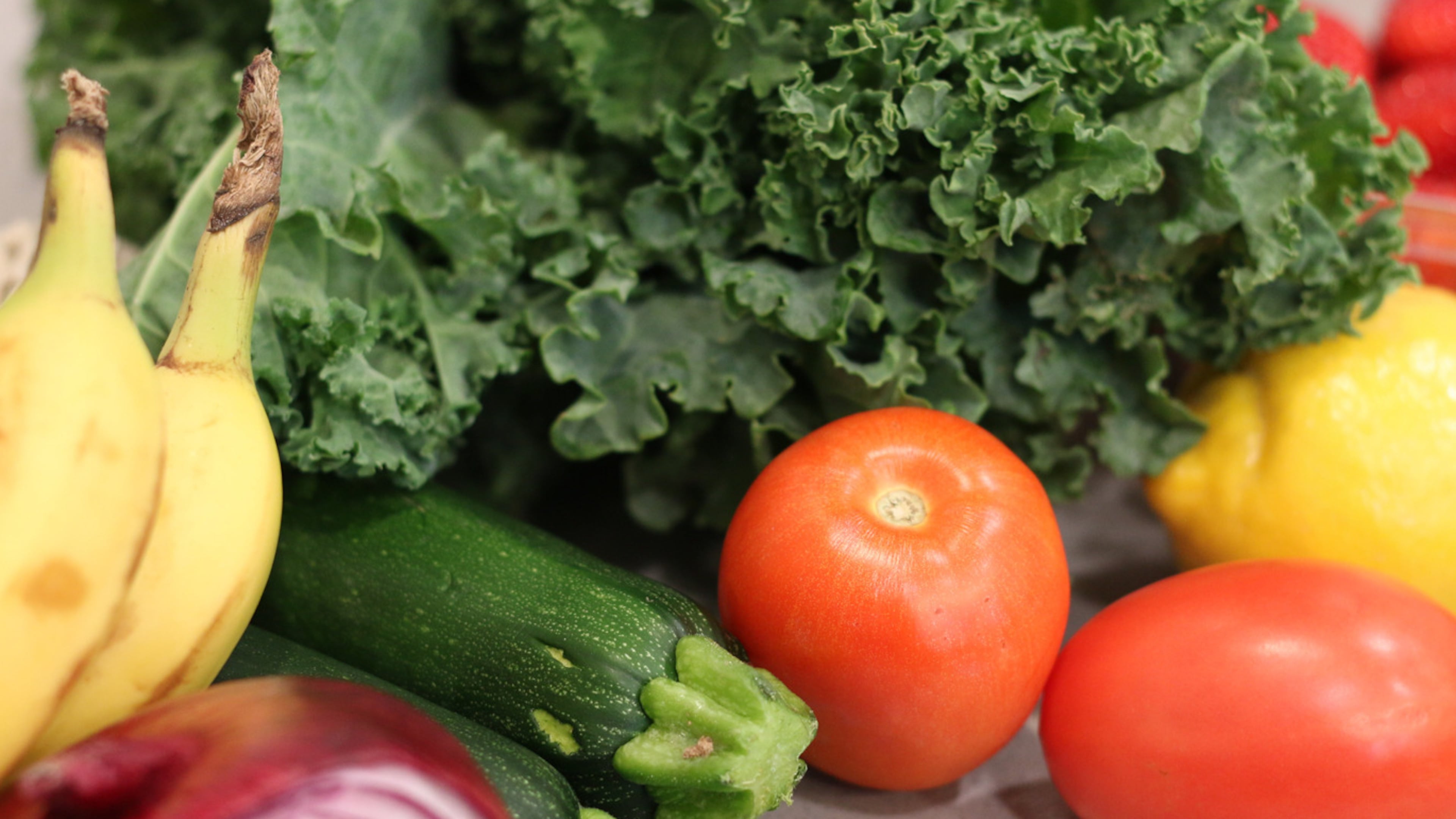 Groceries lay on a kitchen counter before being sorted for storage in the pantry and refrigerator Oct. 25, 2025, in Flagstaff, Ariz. (AP Photo/Cheyanne Mumphrey)