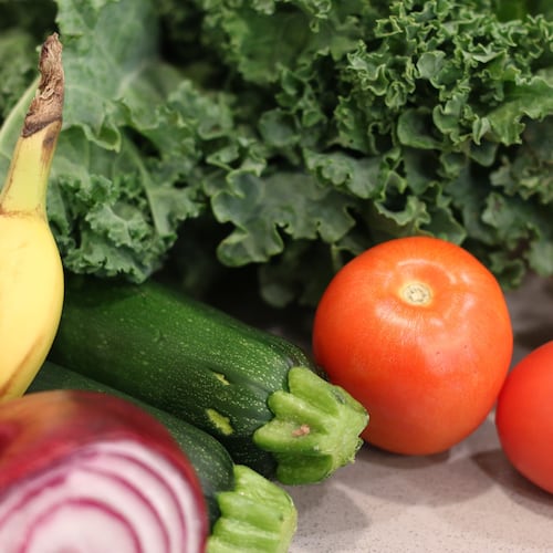 Groceries lay on a kitchen counter before being sorted for storage in the pantry and refrigerator Oct. 25, 2025, in Flagstaff, Ariz. (AP Photo/Cheyanne Mumphrey)