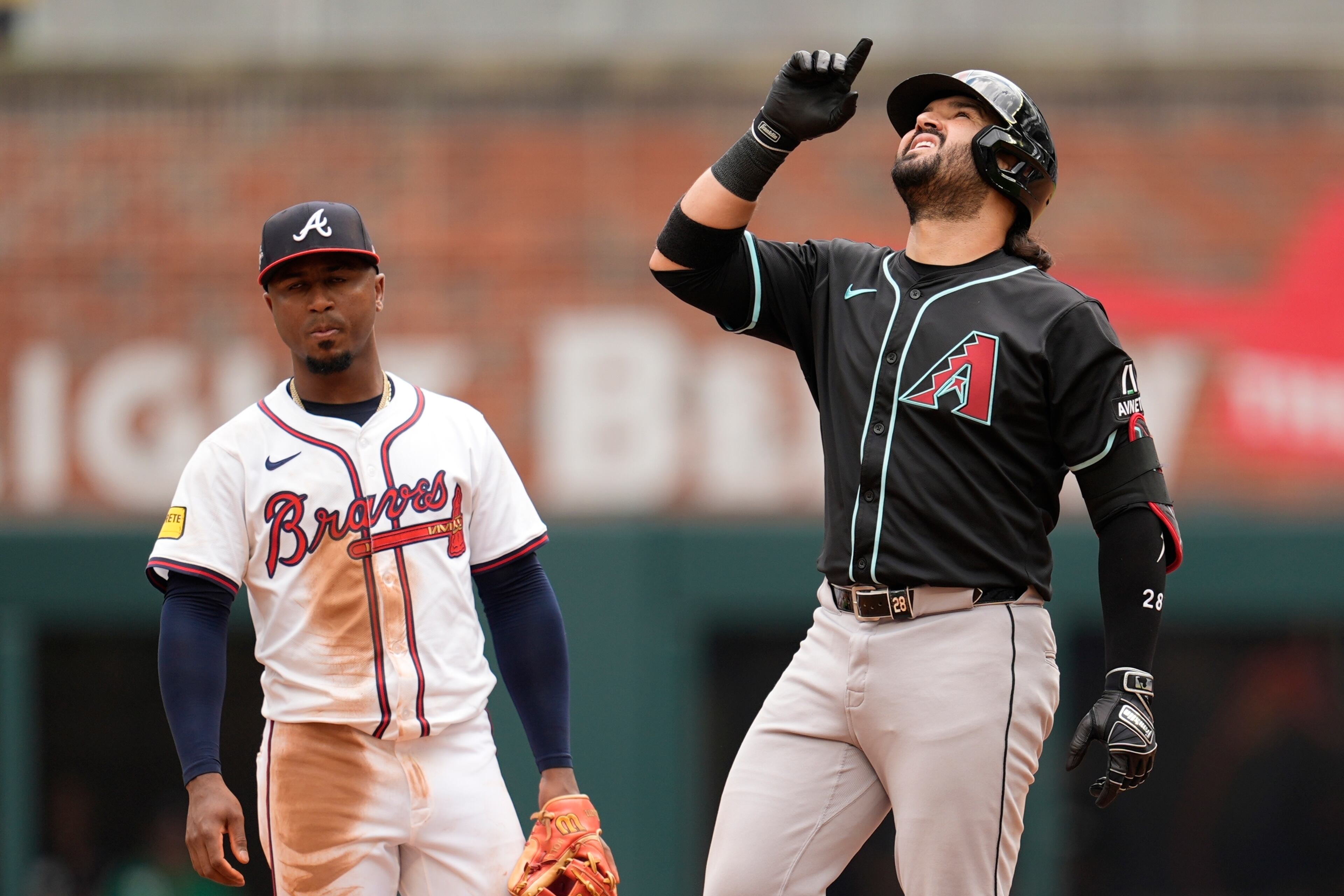 Braves second baseman Ozzie Albies wasn't stoked about Eugenio Suarez' go-ahead ninth-inning double.