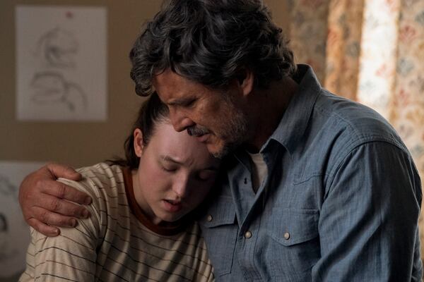 This image released by HBO shows Bella Ramsey, left, and Pedro Pascal in a scene from "The Last of Us." (HBO via AP)
