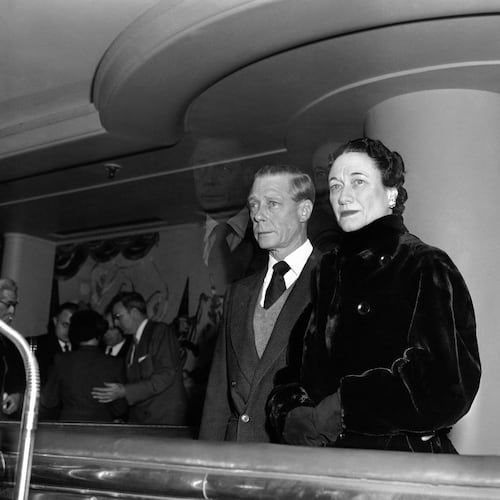 FILE - The Duke of Windsor, Prince Edward stands with his wife the Duchess of Windsor, Wallis Simpson, before he sailed on the Queen Mary from New York on Feb. 7, 1952, en route to England for the funeral of his brother, the late King George VI.  (AP Photo, File)