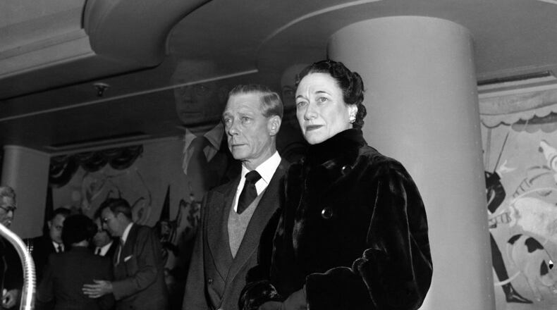 FILE - The Duke of Windsor, Prince Edward stands with his wife the Duchess of Windsor, Wallis Simpson, before he sailed on the Queen Mary from New York on Feb. 7, 1952, en route to England for the funeral of his brother, the late King George VI. (AP Photo, File)