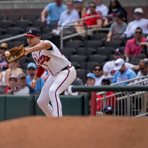 Atlanta Braves first baseman Matt Olson catches a groundout during the seventh inning of a baseball game against the Arizona Diamondbacks, Sunday, Aug. 16, 2026, in Atlanta. (AP Photo/Erik Rank)