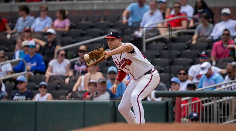 Atlanta Braves first baseman Matt Olson catches a groundout during the seventh inning of a baseball game against the Arizona Diamondbacks, Sunday, Aug. 16, 2026, in Atlanta. (AP Photo/Erik Rank)