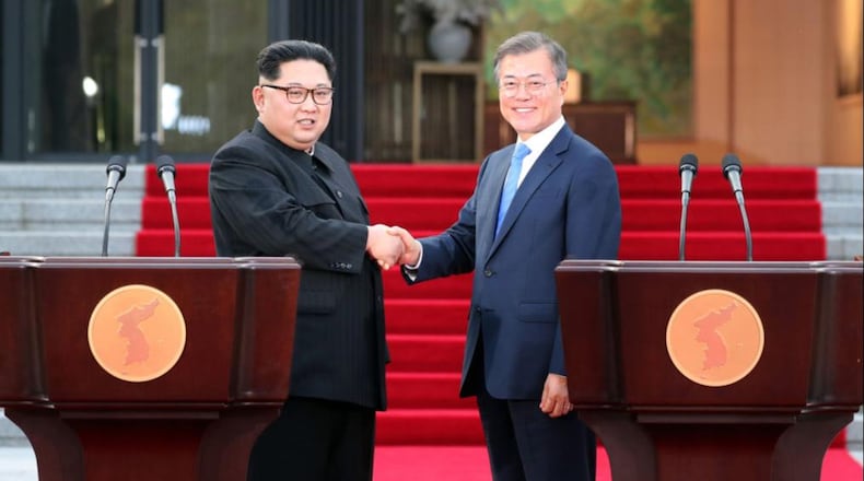 South Korean President Moon Jae-in, right, said President Donald Trump deserves a Nobel Peace Prize for his efforts in ending the stalemate with North Korea and its leader, KIm Jong Un, left.