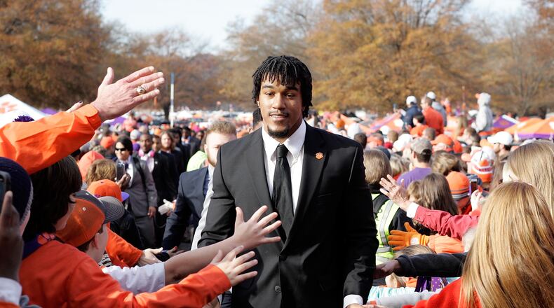 Vic Beasley of the Clemson Tigers greets fans as he enters the stadium prior to their game against the South Carolina Gamecocks at Memorial Stadium on November 29, 2014 in Clemson, South Carolina. (Photo by Tyler Smith/Getty Images)