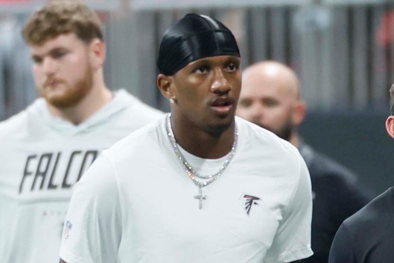 Atlanta Falcons quarterback Michael Penix Jr. looks on as his team fails to get offensive plays in the second half of an NFL game against the Carolina Panthers at Mercedes-Benz Stadium in Atlanta on Sunday, Sept. 20, 2026. (Miguel Martinez/AJC)