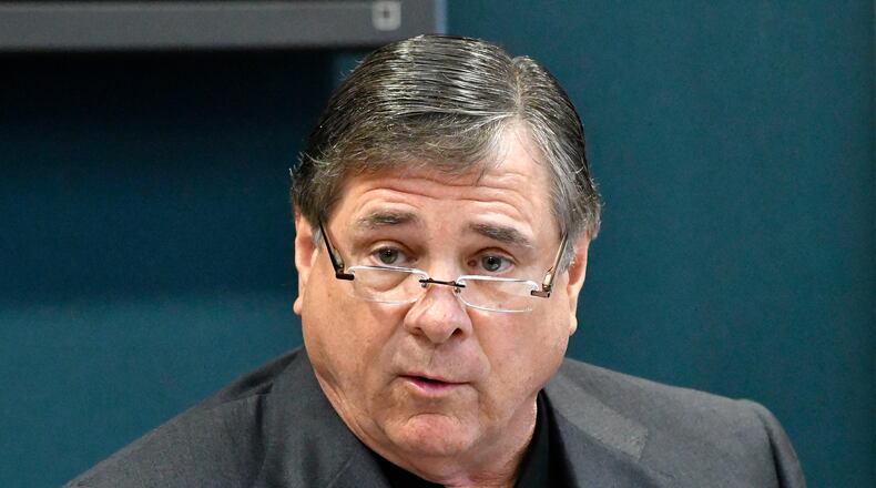 FILE - In this Oct. 20, 2016, file photo, University of Louisville Athletic Director Tom Jurich responds to a question during a press conference, in Louisville, Ky. Louisville athletic director Tom Jurich says a former Wake Forest assistant coach-turned-broadcaster did share "a few plays" with a Cardinals assistant before the teams played last month. Jurich said in a statement Wednesday, Dec. 14, 2016, that Louisville offensive coordinator Lonnie Galloway received a call from Demon Deacons radio analyst and former assistant Tommy Elrod before the game on Nov. 12. Jurich says Elrod passed along the plays that were then shared with the defensive staff, but "none of the special plays were run during the course of the game." (AP Photo/Timothy D. Easley, File)