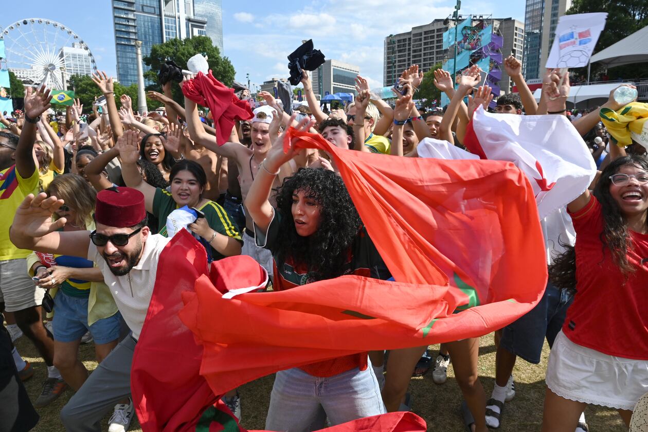 Morocco fans cheer as they gather to watch the match between Morocco vs. Haiti at the FIFA Fan Festival in Centennial Olympic Park on Wednesday, June 24, 2026, in Atlanta. (Hyosub Shin/AJC)