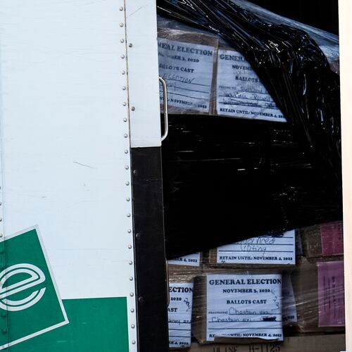 FILE - Georgia general election 2020 ballots are loaded by the FBI onto trucks at the Fulton County Election HUB, Jan. 28, 2026, in Union City, Ga., near Atlanta. (AP Photo/Mike Stewart, File)