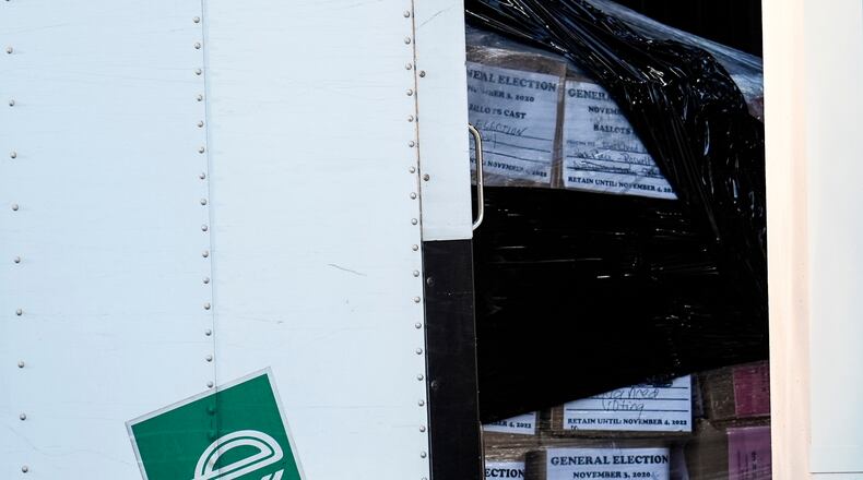 FILE - Georgia general election 2020 ballots are loaded by the FBI onto trucks at the Fulton County Election HUB, Jan. 28, 2026, in Union City, Ga., near Atlanta. (AP Photo/Mike Stewart, File)